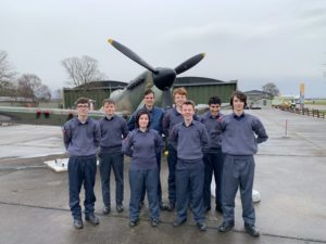 CCF RAF cadets standing in front of a spitfire