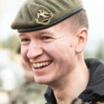 A CCF member of staff smiling