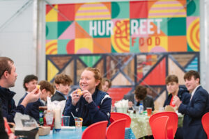 Staff members sitting having lunch